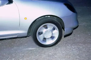 Rubber Prints: Wheel spin on 1998 Ford Puma producing smoke