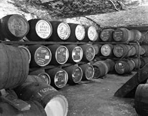 Cask Gallery: Whisky in barrels at a bonded warehouse, Sheffield, South Yorkshire, 1960. Artist