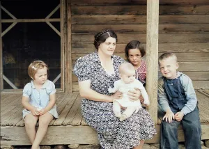 Sharecropper Prints: Wife and children of tobacco sharecropper on front porch