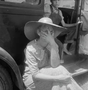 Wife of sharecropper in town to sell their crop at the tobacco auction, Douglas, Georgia, 1938. Creator: Dorothea Lange