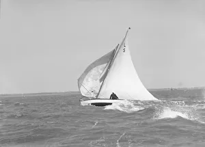 Sloop Prints: Windy conditions for the 6 Metre yacht Snowdrop, 1911. Creator: Kirk & Sons of Cowes