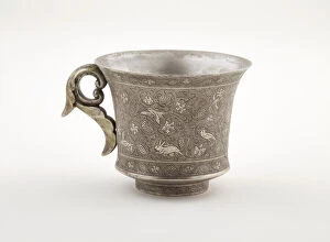 Republic Of China Gallery: Wine cup with ring handle, birds, animals, and grape vines, Early Tang dynasty