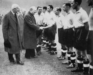 Prime Minister Collection: Winston Churchill greets the England football team, Wembley, London