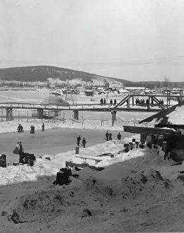 Winter bridge over river, between c1900 and c1930. Creator: Unknown