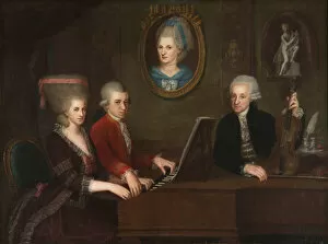 Wolfgang Amadeus Mozart with sister Maria Anna and father Leopold, on the wall a portrait of the dec