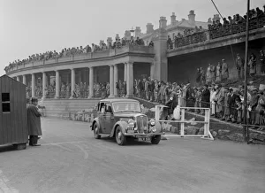 Blackpool Gallery: Wolseley of J Malkin competing in the Blackpool Rally, 1936. Artist: Bill Brunell