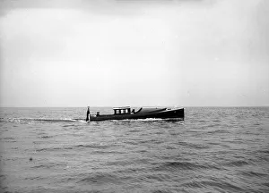 Wolseley motor launch under way, 1913. Creator: Kirk & Sons of Cowes Wolseley motor launch under way, 1913. Creator: Kirk & Sons of Cowes