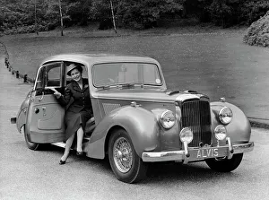 Alvis Prints: Woman in a 1954 Alvis 3 litre TC 21, (late 1950s?)