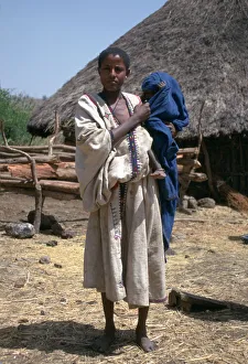 East African Prints: Woman and baby in a village near the Blue Nile Falls, Ethiopia