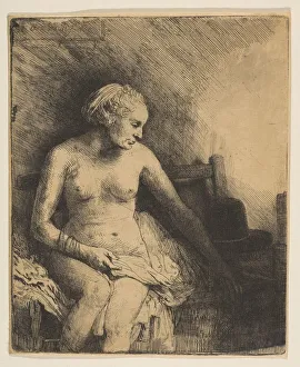 Paul Rembrandt Prints: Woman at the Bath with a Hat beside Her, 1658. Creator: Rembrandt Harmensz van Rijn