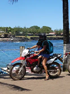 Motorcycle Prints: Woman and child on Honda motorcycle, Chile 2019. Creator: Unknown