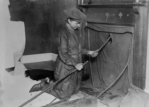 Cleaning Prints: Woman chimney sweep, between c1915 and 1918. Creator: Bain News Service