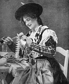 A woman creatively peeling a potato, 1922.Artist: Georg Haeckel A woman creatively peeling a potato, 1922.Artist: Georg Haeckel