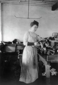 Supervisor Prints: Woman distributing work in a shoe factory