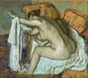 In The Bed Prints: Woman Drying her Left Arm (After the Bath), ca 1884. Creator: Degas, Edgar (1834-1917)
