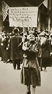 Placard Collection: Woman holding a placard in support of the war effort, USA, World War I, c1914-c1918