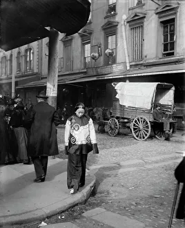Chinese American Prints: A woman in holiday attire, Chinatown