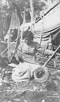 Shoemakers Prints: Woman making snow shoes, between c1900 and c1930. Creator: Unknown