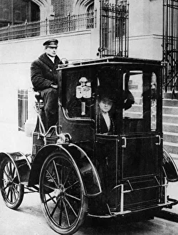 Taxi Driver Prints: Woman passenger in a 1910 taxi cab, New York, USA, (c1910?)