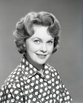 Blouse Prints: Woman in patterned blouse, c1955. Creator: Arthur Charles Kirby Ware