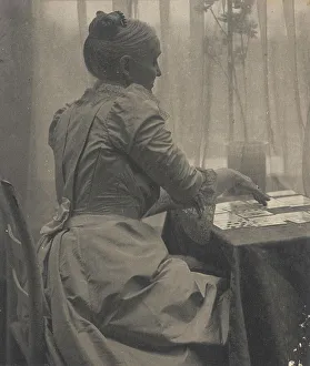 Kasebier Gertrude Prints: Woman Playing Solitaire, c.1910. Creator: Gertrude Kasebier