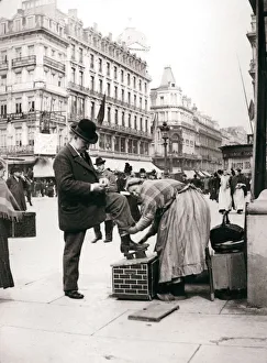Polishing Prints: Woman polishing shoes, Brussels, 1898. Artist: James Batkin