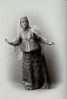 Scary Prints: A woman posing in a photographic studio