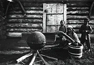 Distillation Prints: Woman preparing tarasun, 1890. Creator: Unknown