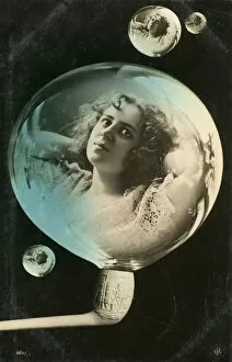 Images Dated 2nd September 2010: Woman reflected in a bubble, postcard, c1890-c1909(?)