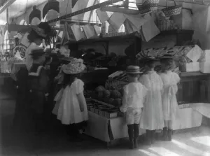 Vegetable Stall Prints: Woman schoolteacher and group of young pupils examining fruits and vegetab