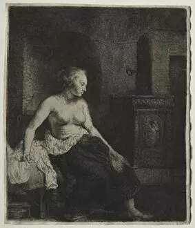 Rembrandt Van Rijn Gallery: Woman Sitting Half Dressed Beside a Stove, 1658. Creator: Rembrandt van Rijn (Dutch, 1606-1669)