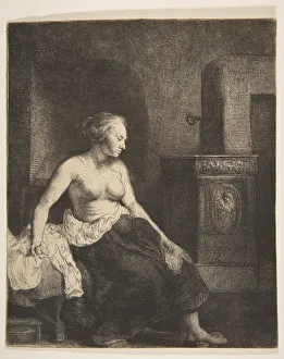 Woman Sitting Half-Dressed beside a Stove, 1658. Creator: Rembrandt Harmensz van Rijn Woman Sitting Half-Dressed beside a Stove, 1658. Creator: Rembrandt Harmensz van Rijn