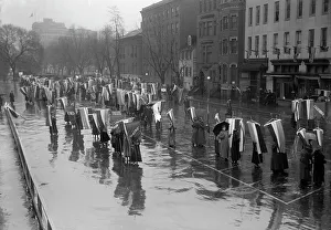 Woman Suffrage - Marching in Rain, 1917. Creator: Harris & Ewing. Woman Suffrage - Marching in Rain, 1917. Creator: Harris & Ewing