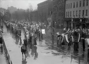 Woman Suffrage - Marching in Rain, 1917. Creator: Harris & Ewing. Woman Suffrage - Marching in Rain, 1917. Creator: Harris & Ewing