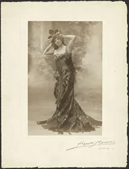 Floral Motif Prints: Woman wearing headdress with grapes, about 1890. Creator: Henri Mannes