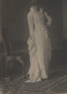 Eakins Thomas Prints: [Woman in White Laced-bodice Dress in Studio of Thomas Eakins], 1880s. 1880s