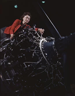 Airplane Industry Gallery: Woman at work on motor, Douglas Aircraft Company, Long Beach, Calif. 1942. Creator: Alfred T Palmer