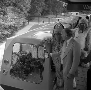 Edward Douglas Scott Montagu Gallery: The Wombles with Lord Montagu at opening of Beaulieu Monorail 1974. Creator: Unknown