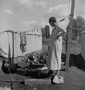 Women in auto camp for migrant citrus workers, Tulare County, California, 1938. Creator: Dorothea Lange