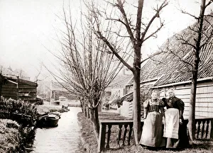 Batkin Prints: Two women on a canal bank, Broek, Netherlands, 1898. Artist: James Batkin
