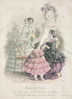 Two women and a child wearing the latest fashions in a garden setting, 1858
