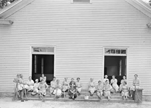 Step Gallery: Women of the congregation of Wheeleys Church on steps... Gordonton, North Carolina, 1939