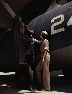 Consolidated Aircraft Corporation Gallery: Women are contributing their skills to the nations needs by keeping...Corpus Christi, Texas, 1942