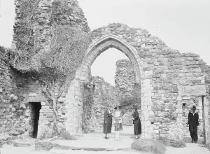 Portal Prints: Three women and a man standing in front of ruins