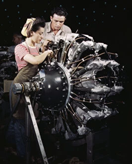 War Industry Gallery: Women are trained as engine mechanics in thorough Douglas training... Long Beach, Calif. 1942