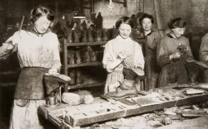 War Work Gallery: Women working in a boot repairing factory, Old Kent Road, London, World War I, c1914-c1918