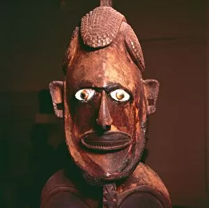Wooden figure from New Ireland, Melanesia