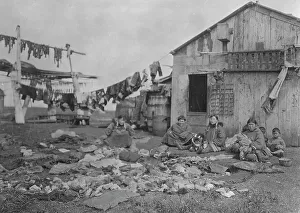 Alaskan Prints: Wooden home of Alaskan Eskimo family, (1929?). Creator: Unknown