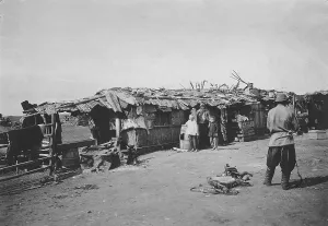 Vonago Li Prints: Workers booths on Lake Shira. 1900-1909. Creator: LI Vonago