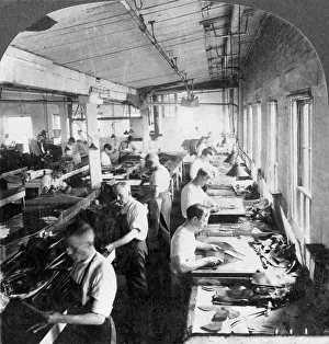 Lynn Prints: Workers cutting leather for shoes in a factory